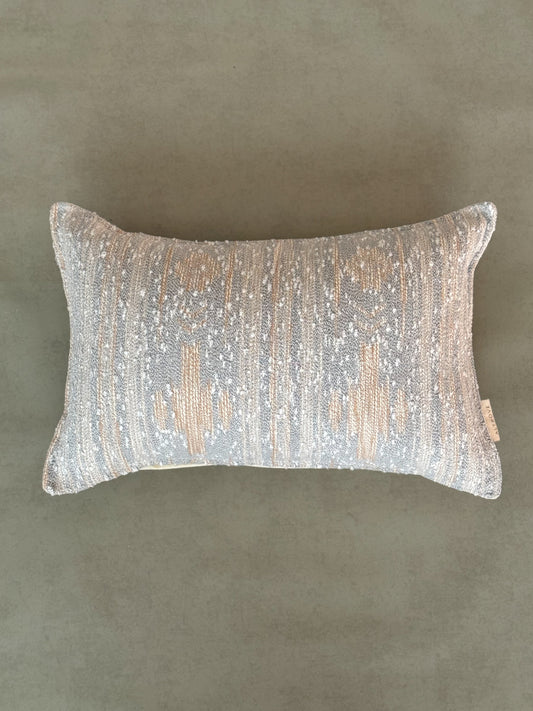 Grey decorative cotton oblong cushion to be styled on sofa,chair or bed.
