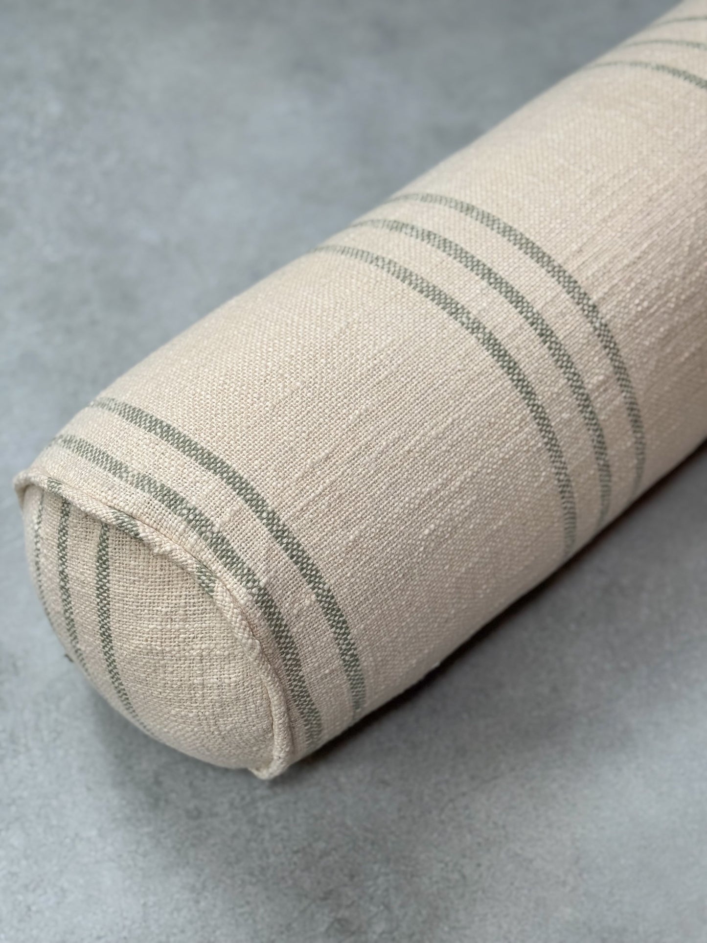 CARA GREEN STRIPED BOLSTER CUSHION