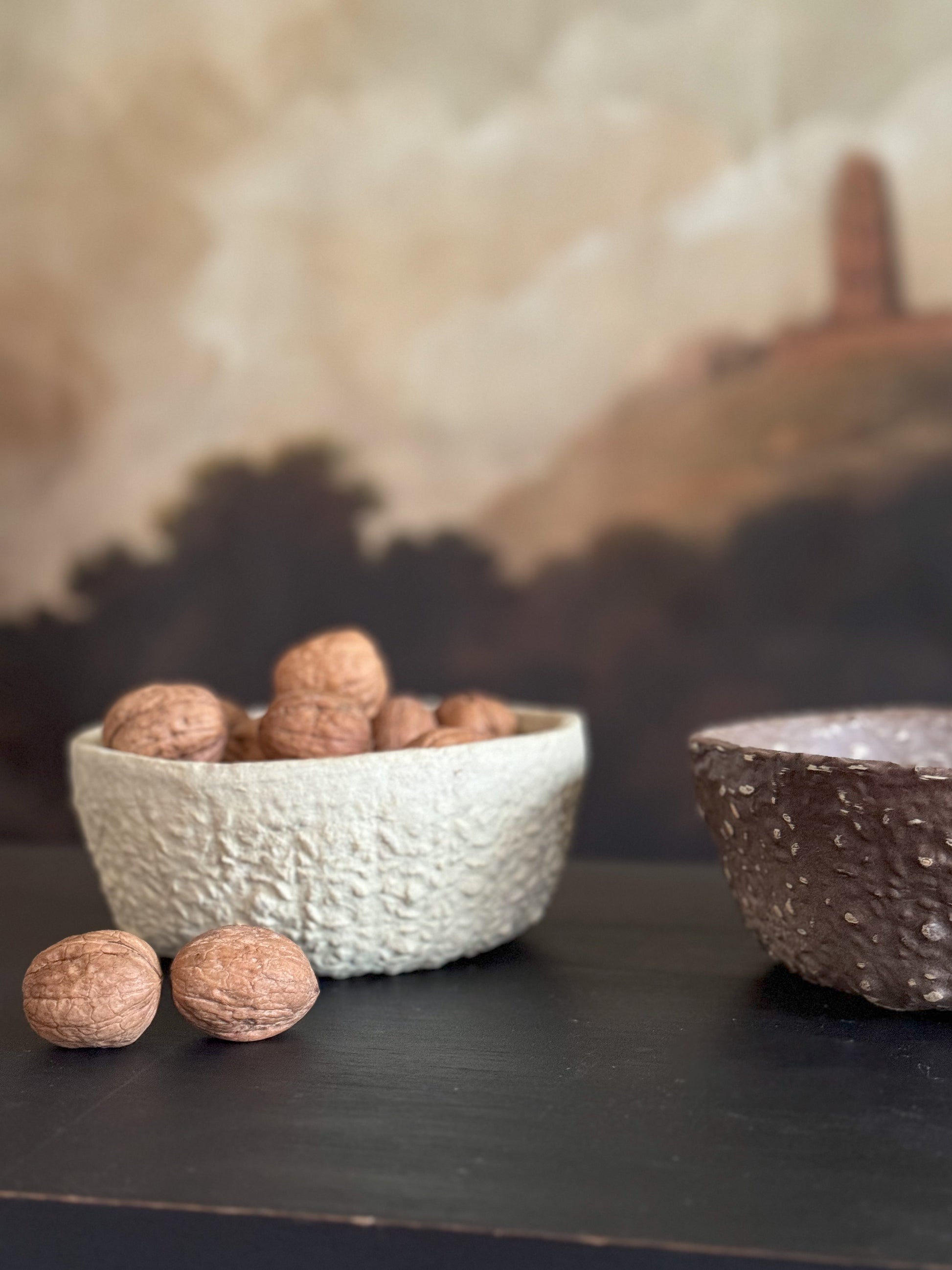 Ivory round shaped and unique paper mache textured bowl.