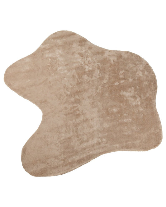 Beige animal-shaped rug on a white background