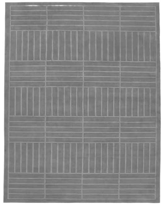 Gray area rug with a geometric pattern on a white background