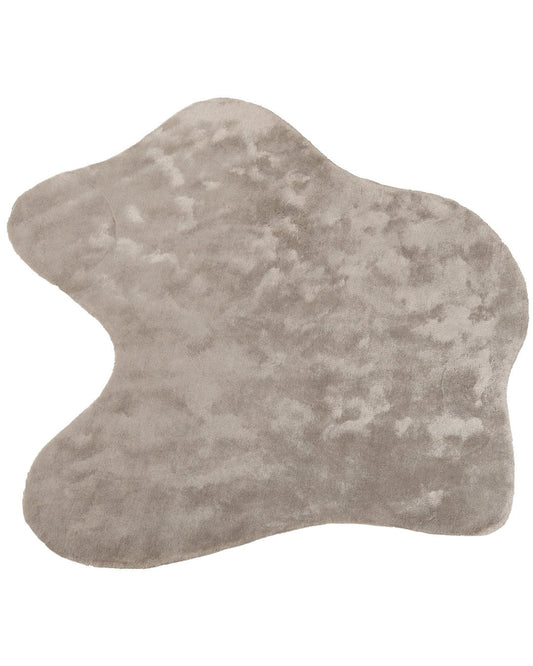 Grayish-brown cowhide rug on a white background