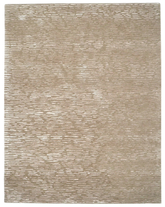 Textured beige area rug on a white background
