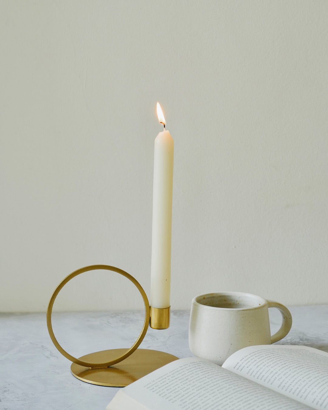 GOLDEN RINGED CANDLE HOLDER
