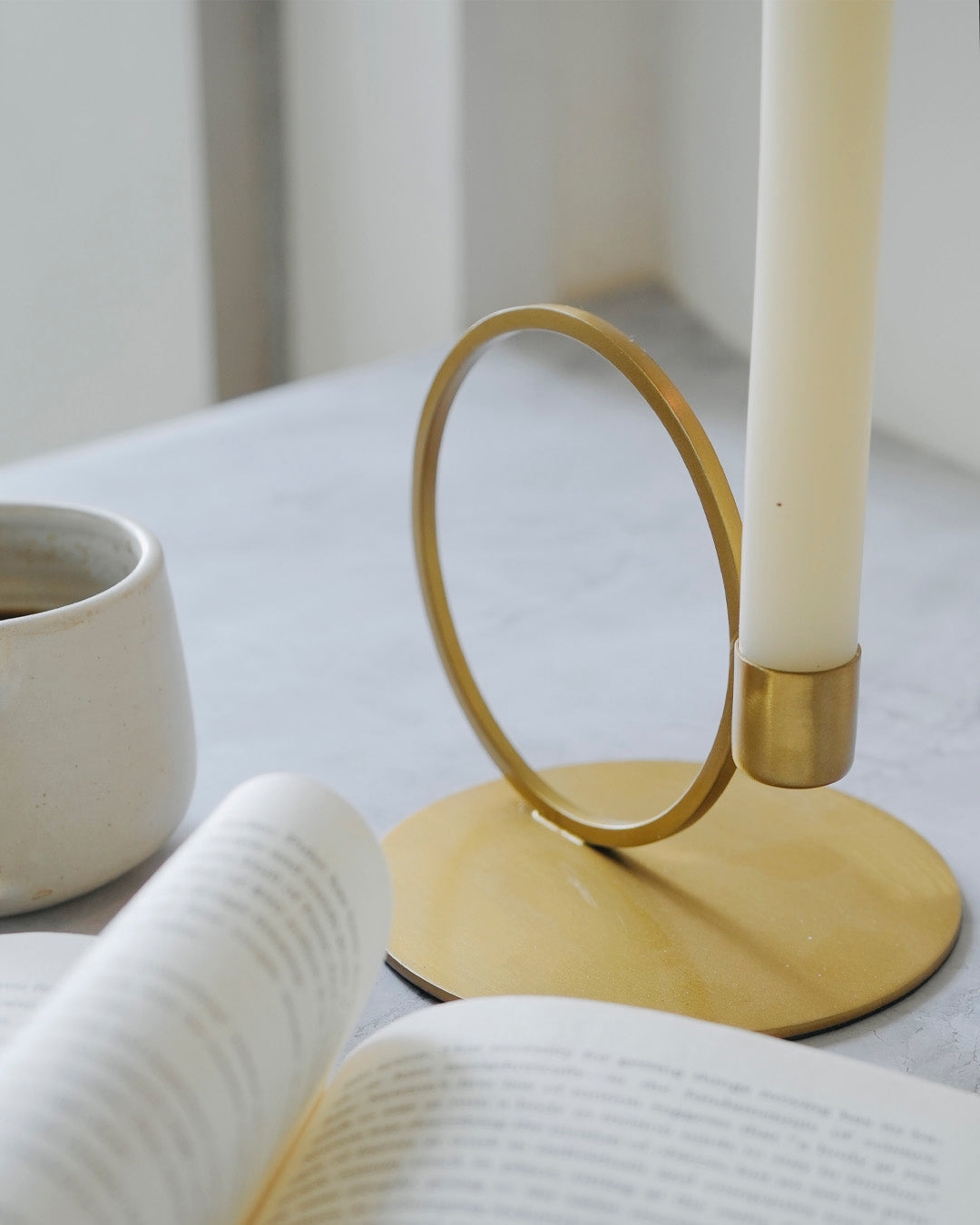 GOLDEN RINGED CANDLE HOLDER