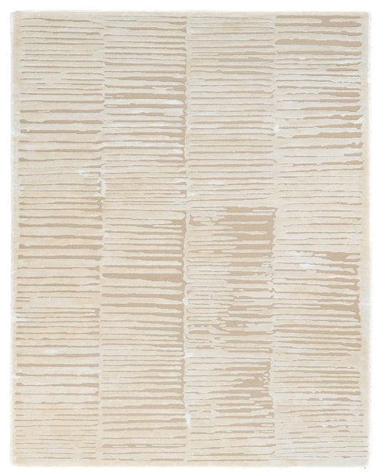 A beige wool and silk rug with a textured pattern.