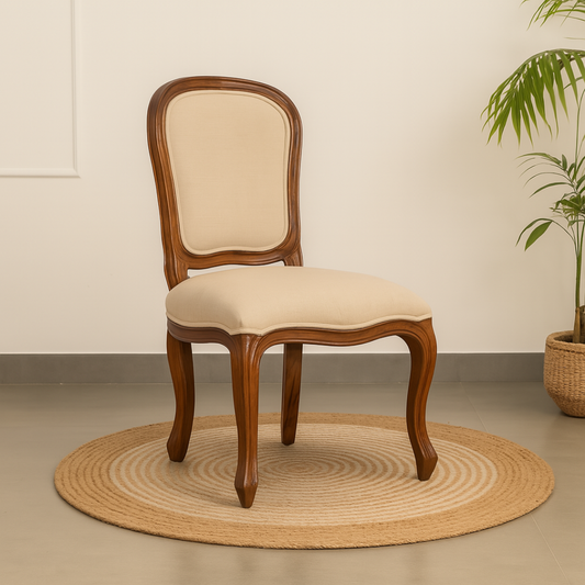 Wooden chair with beige cushion.