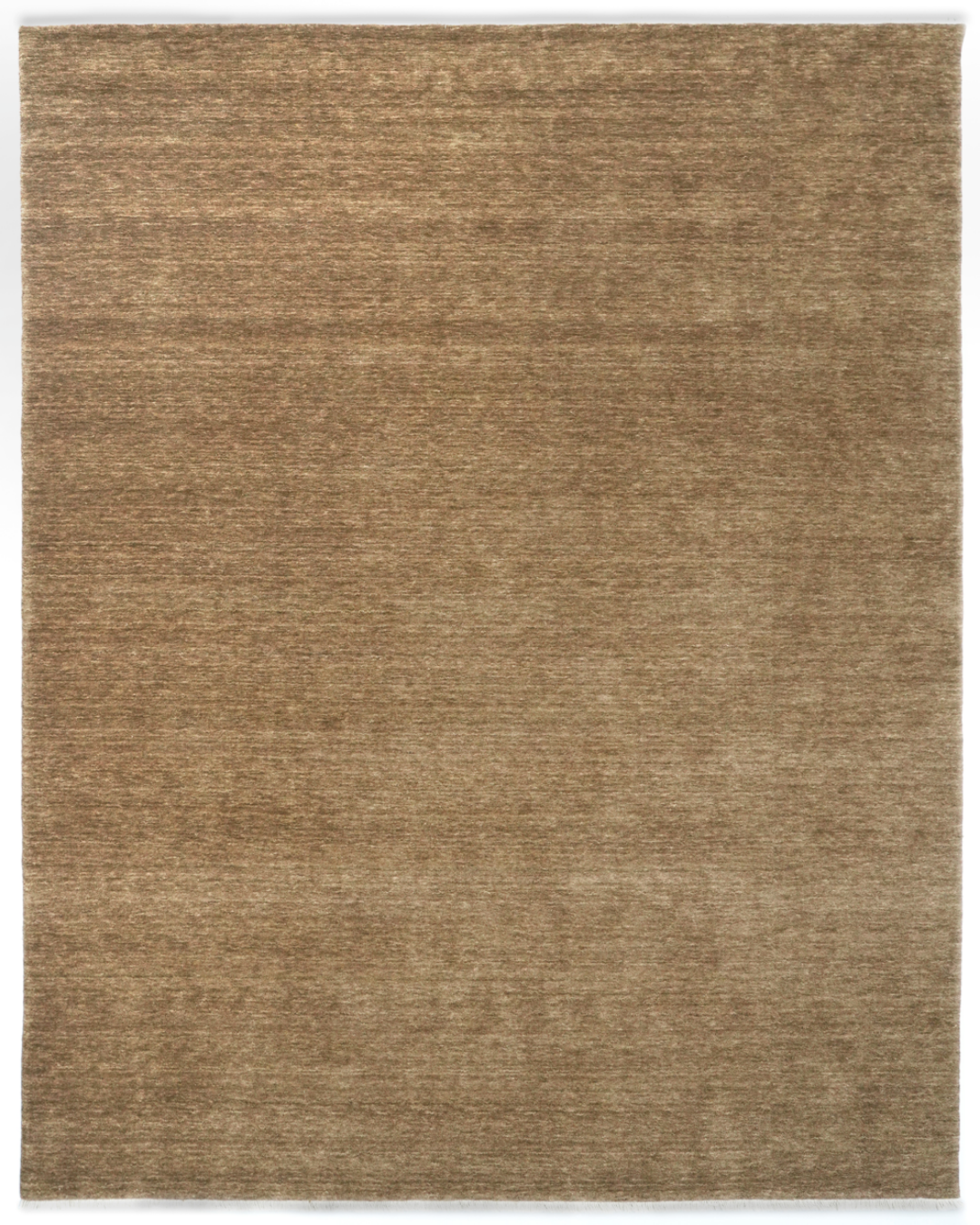 Brown area rug with a subtle pattern on a white background
