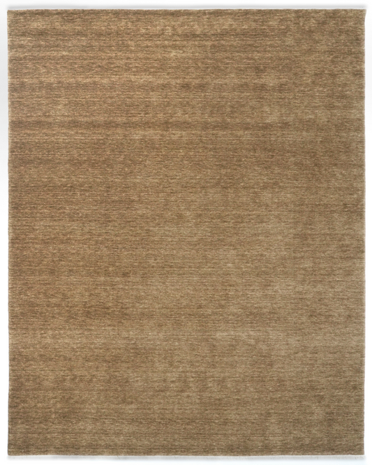 Brown area rug with a subtle pattern on a white background