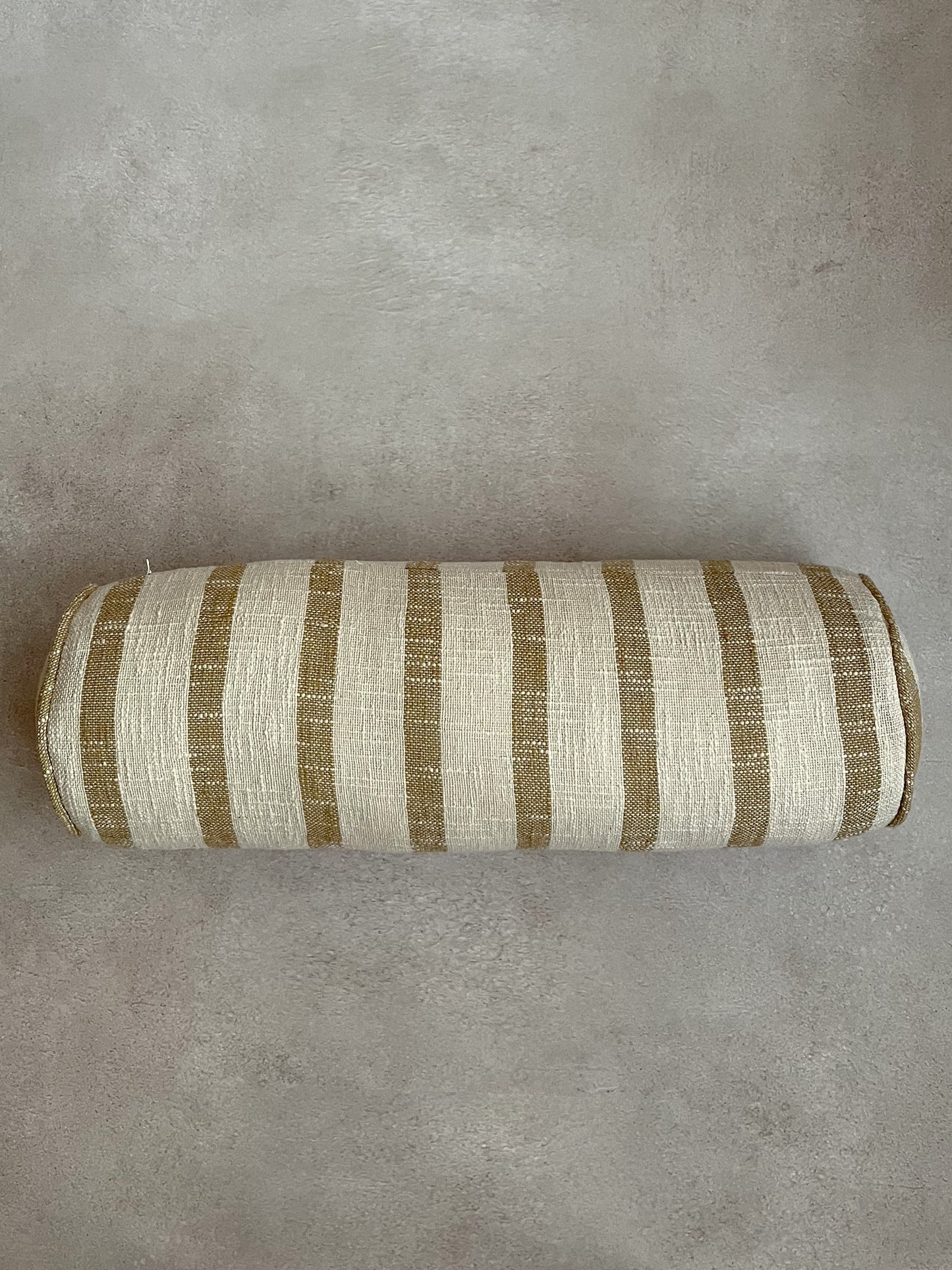 White and beige striped bolster cushion
