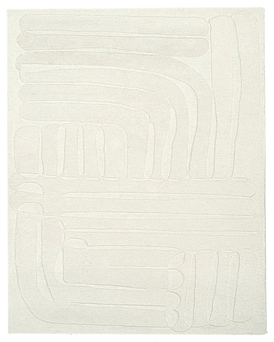 White bath mat with abstract pattern on a white background