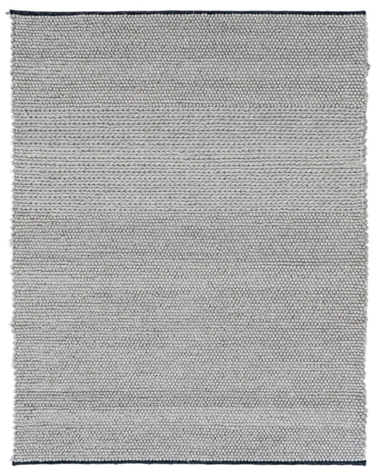 Gray textured rug with a subtle pattern on a white background