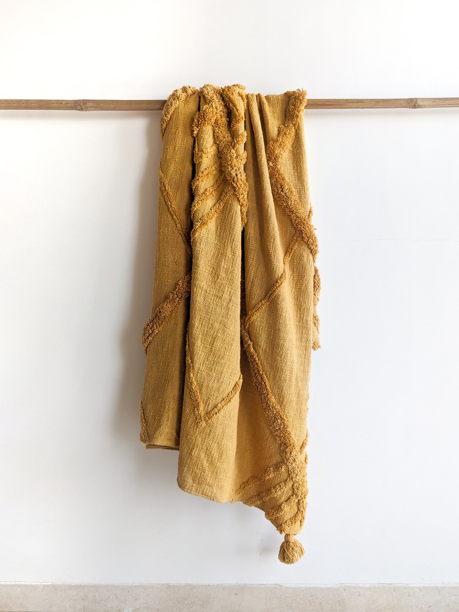 mustard adam throw for sofa by Altrove