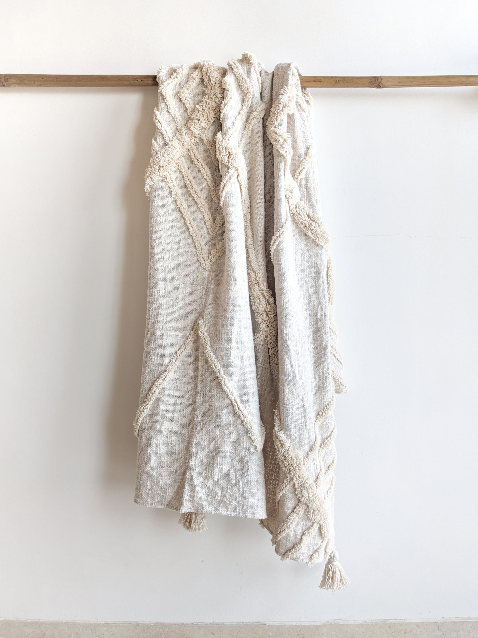 adam ivory sofa throw by Altrove
