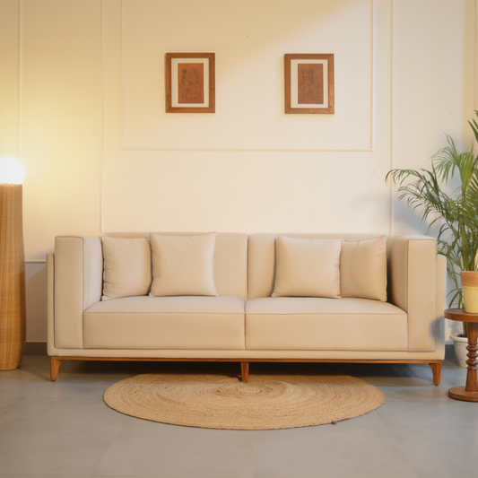Beige sofa in a room
