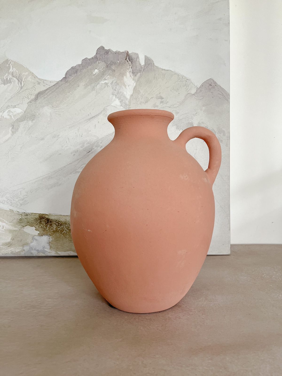 Red clay vase with handle