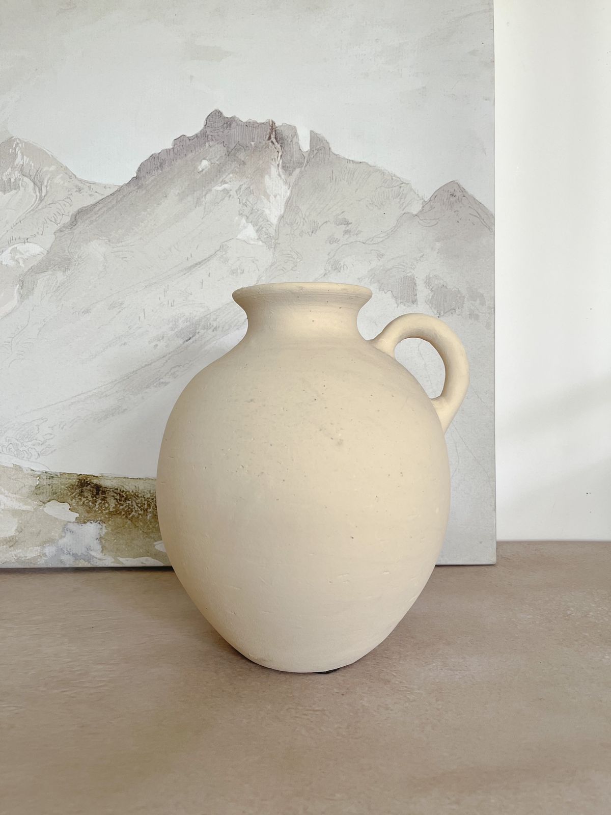 White clay vase with handle