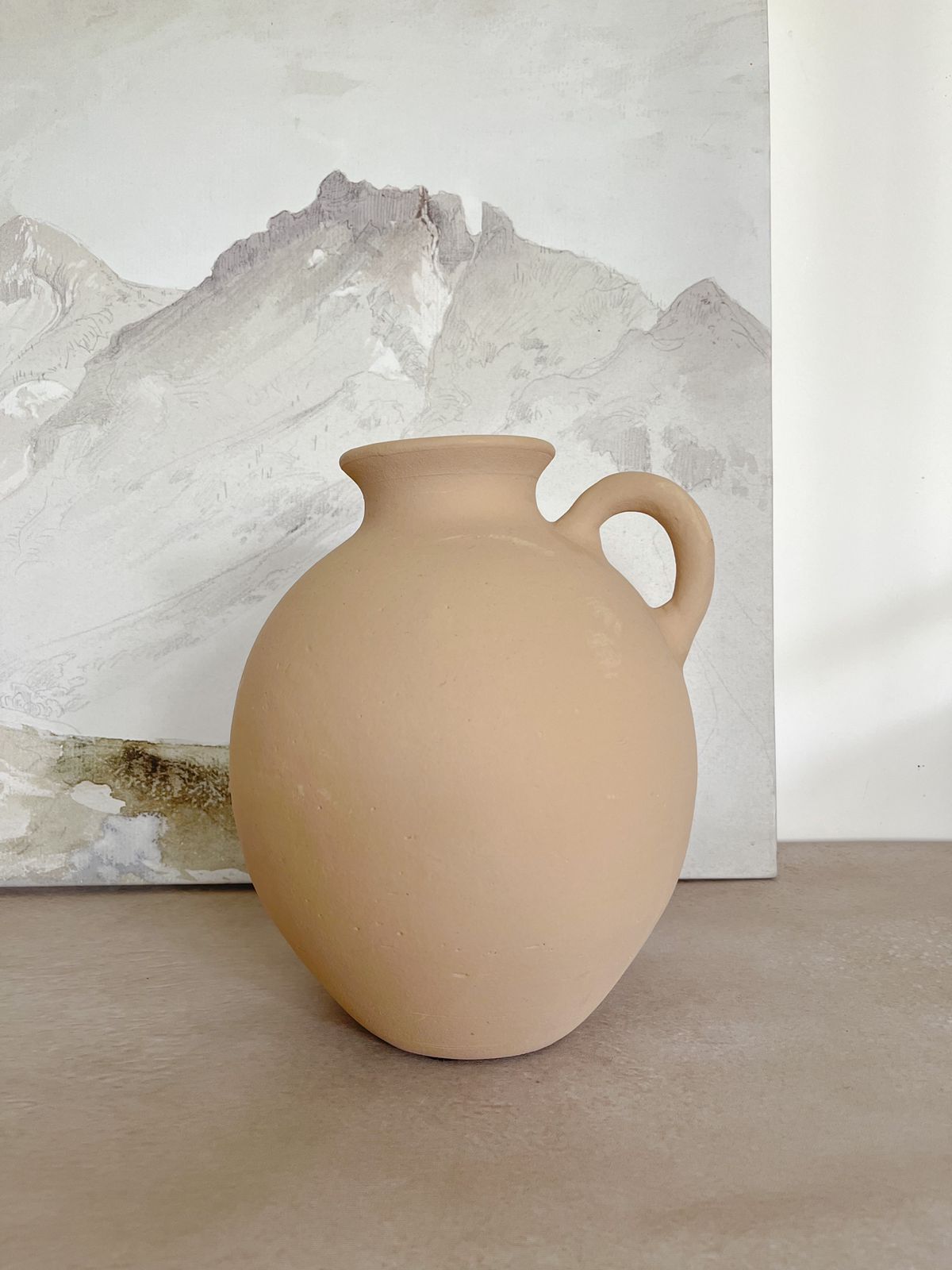 Clay vase with handle