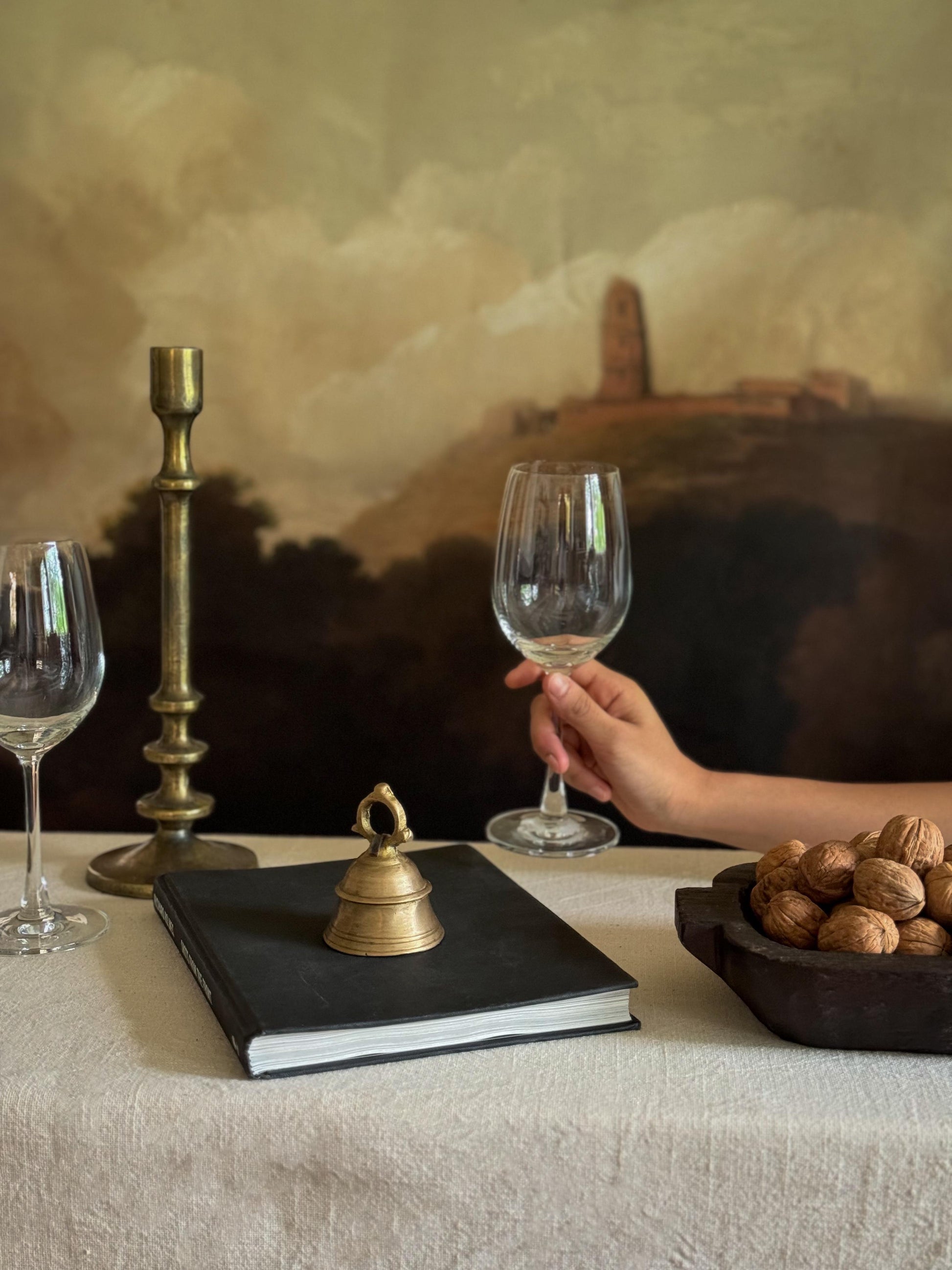 A brass bell for interior styling.