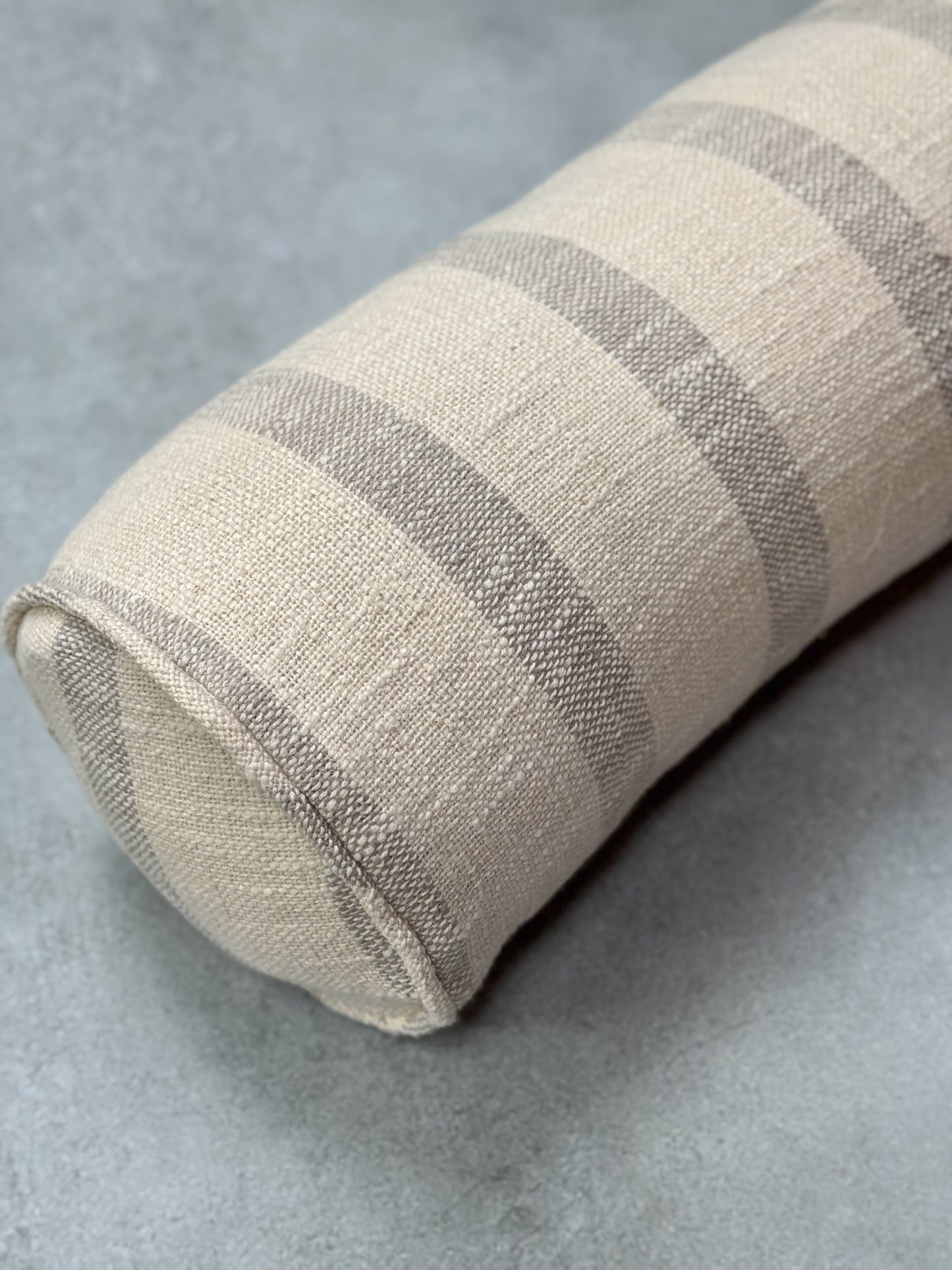 CARA GREY STRIPED BOLSTER CUSHION