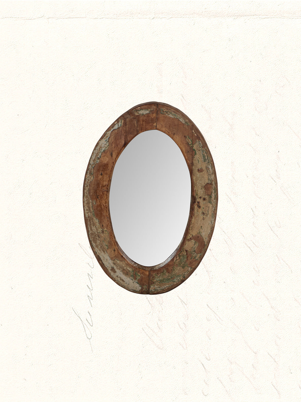Vintage mirror framed in a reclaimed Rajasthani wooden cart wheel, no. 1403