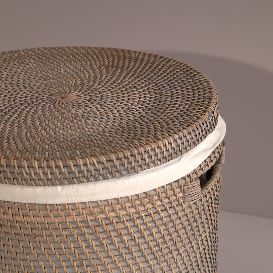 Woven storage basket, Rattan laundry hamper, Wicker bin with lid, Handwoven wicker basket, Natural fiber storage hamper, Rustic laundry bin for home organization, Boho style lidded basket with fabric insert, Natural rattan storage container for bathroom or bedroom, Stylish handwoven basket with modern design.