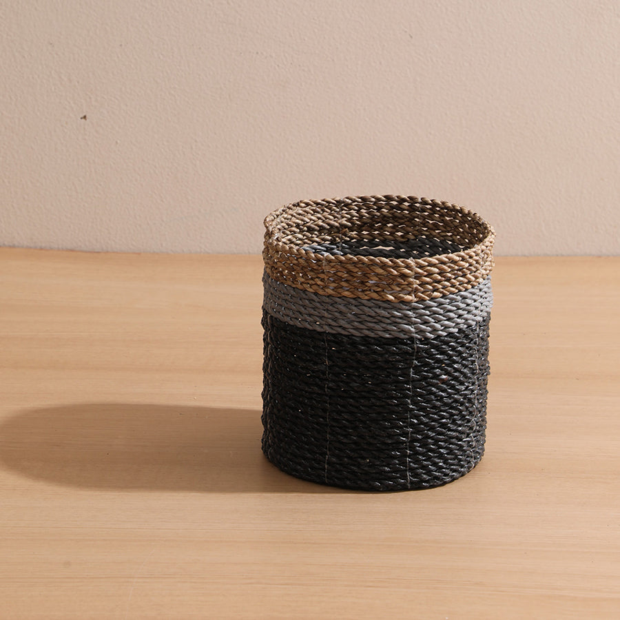 Desk organizer basket, Bathroom countertop storage, Shelf décor basket, Minimalist storage bin, Plant pot cover basket, Entryway key holder basket, Boho style small basket, Bedroom nightstand organizer, Kids toy storage solution, Home office storage, Small woven basket, Handwoven decorative basket, Natural fiber basket, Eco-friendly storage container, Multi-tone seagrass basket, Round wicker basket, Black and brown woven basket, Rustic home storage bin, 
Handmade organizer basket, 
Sustainable décor basket.