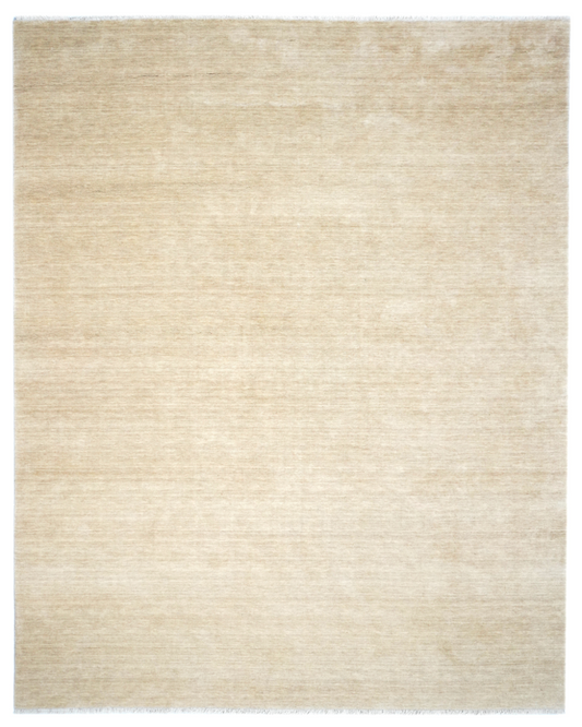 Beige area rug with a subtle pattern on a white background
