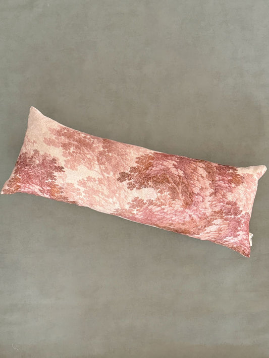 Digital printed body pillow with leafy branches in subtle brown and blush tones.
