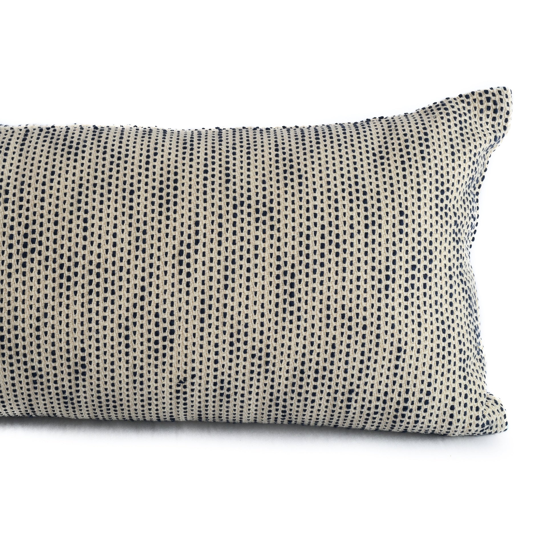 Close up of a Hand woven cotton extra long lumbar cushion cover in a navy blue colour
