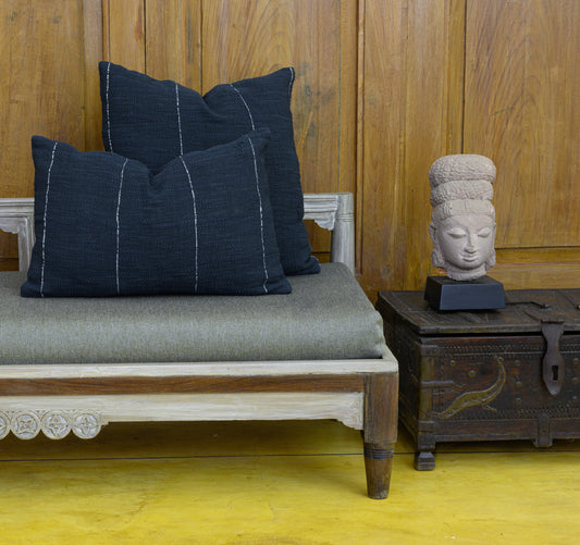 Hand woven Navy Blue cotton cushion cover styled with a woven Navy Blue Throw cushion cover on a bench
