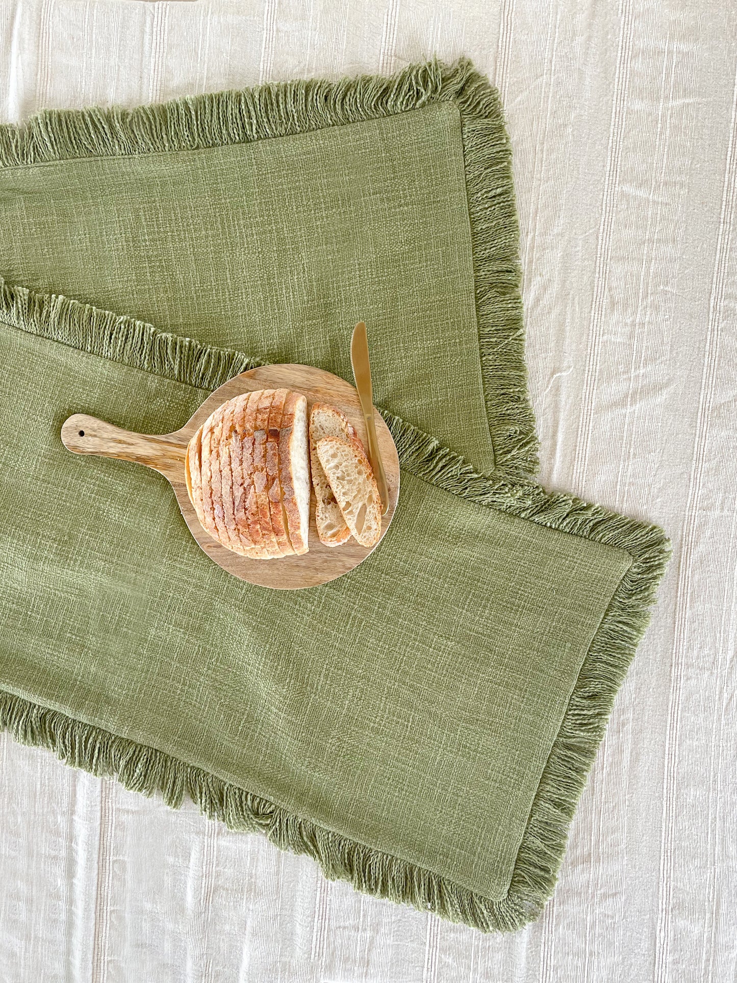 FARROW FRAYED TABLE LINEN - OLIVE