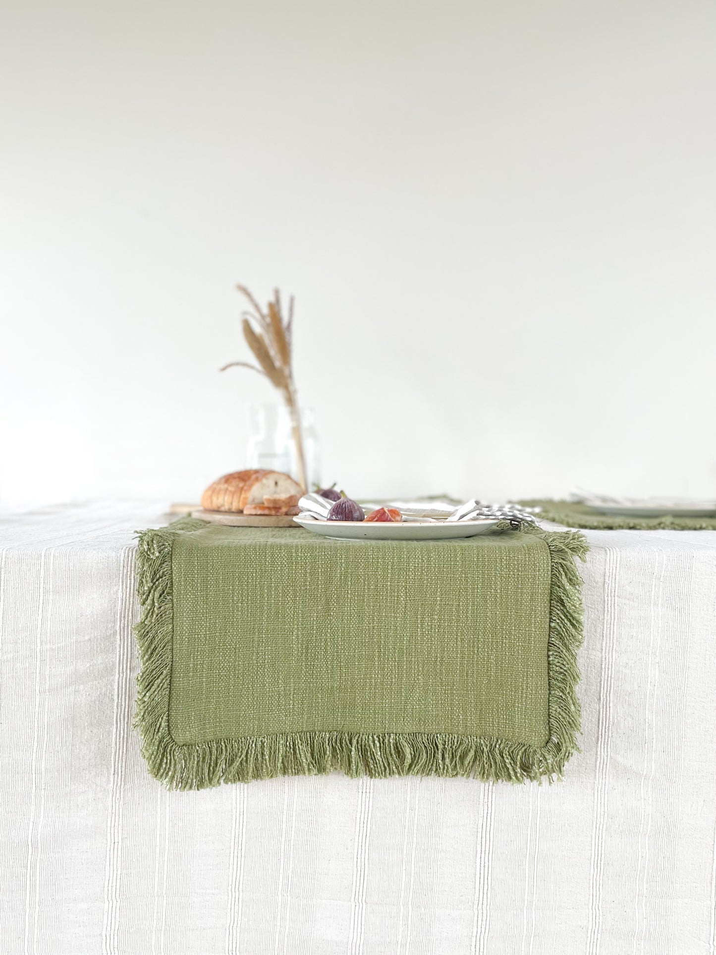 FARROW FRAYED TABLE LINEN - OLIVE