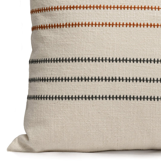 Close up of an Embroidered Terracotta and Charcoal cotton cushion cover